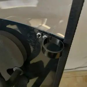 Anti riot shield with baton holder